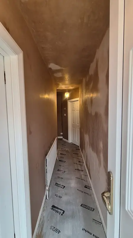 Hallway walls and ceiling freshly skimmed