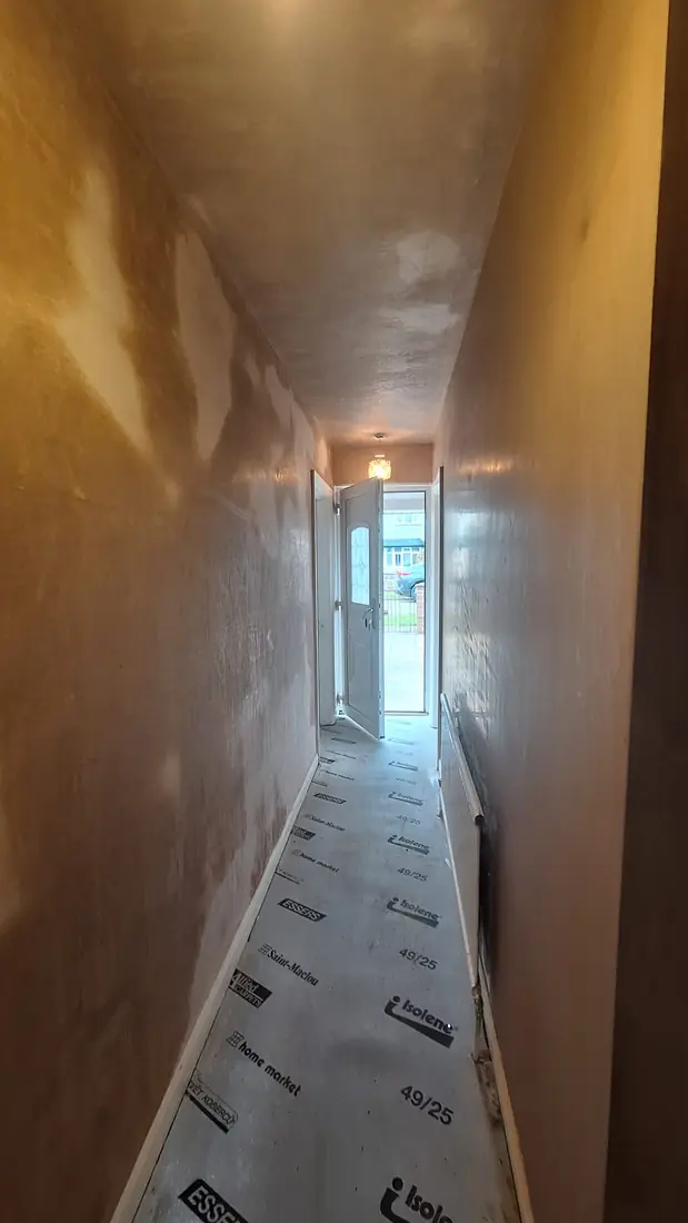Narrow hallway skimmed wall to wall