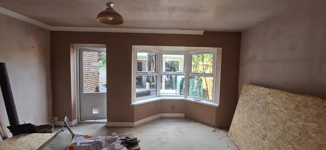 Lounge walls and ceiling skimmed to a flat finish